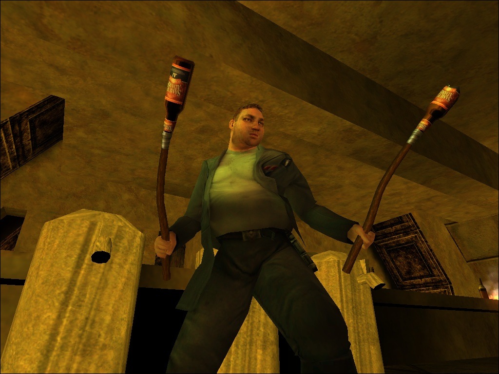 A screenshot showing a character holding a broken and unbroken beer bottle staped to a stick as a weapon.